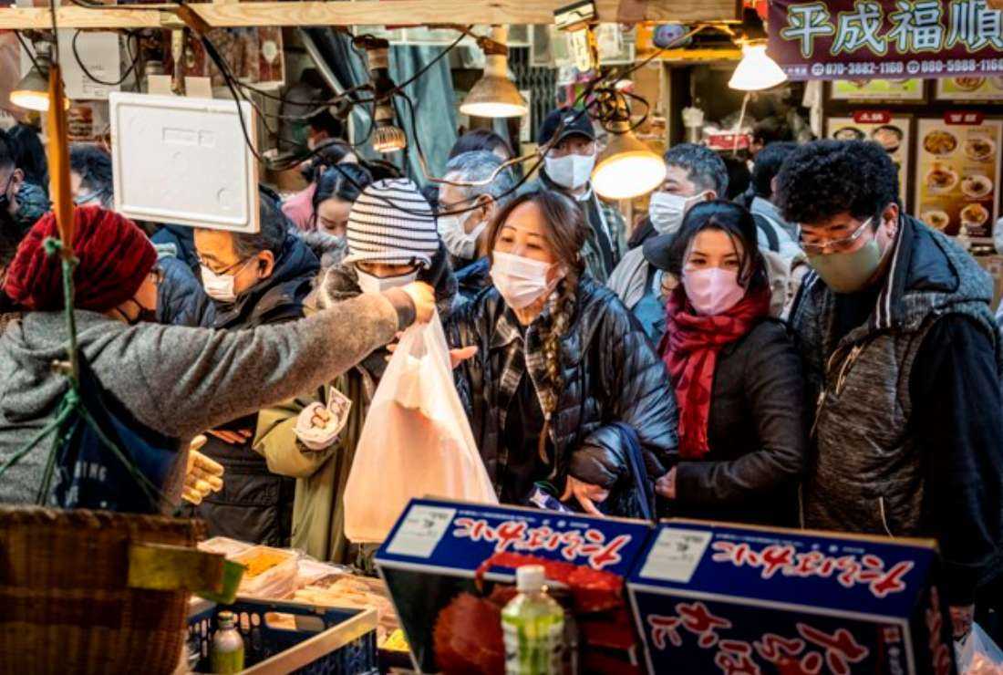 Japanese people shop for food ahead of the New Year holiday in Tokyo on Dec. 29, 2022. The cultivation of seaweed (kaiso or nori), one of the major staples of the Japanese diet, through aquaculture has become a game-changer