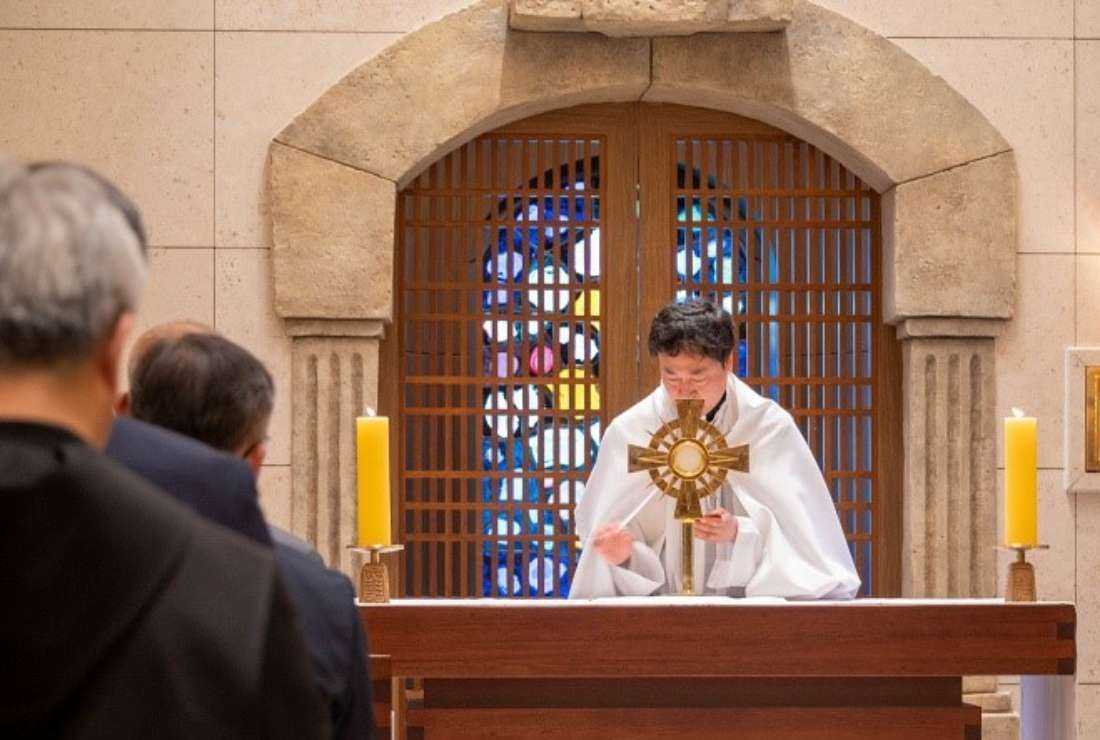 A priest leads a Holy Eucharistic Adoration at JSA Church in Paju of South Korea during the bishops' visit to the church on June 6