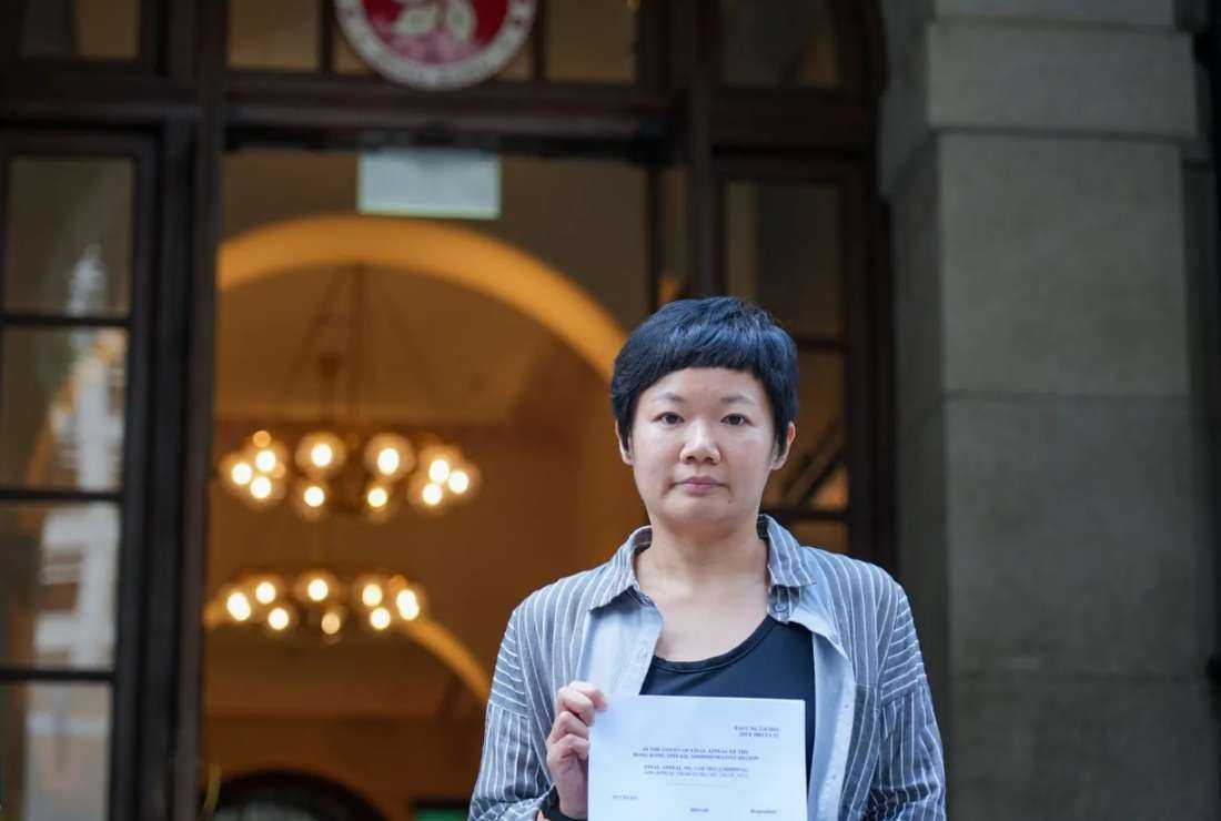 Hong Kong journalist Bao Choy stands outside Hong Kong’s Court of Final Appeal after winning her appeal against her conviction for making false statements to obtain vehicle records, on June 5, 2023