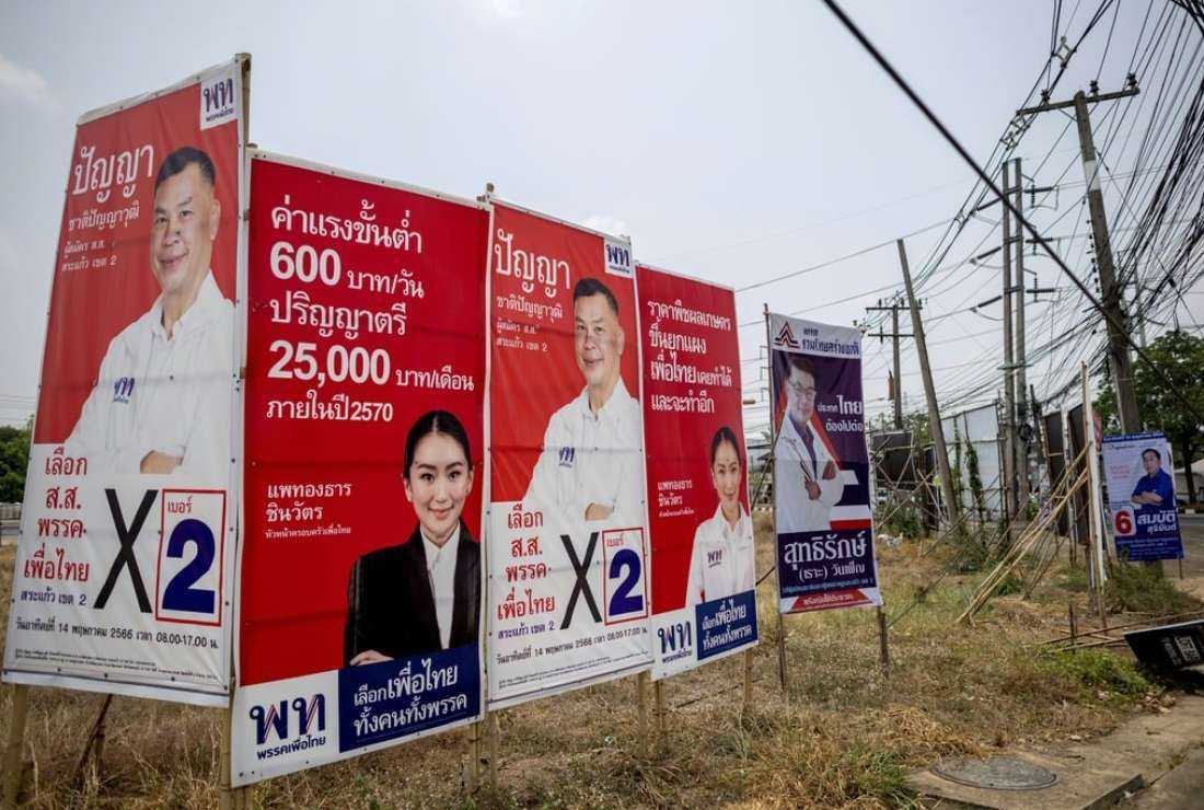 Campaign posters for the upcoming general election are seen in the Thai province of Sa Kaeo last week