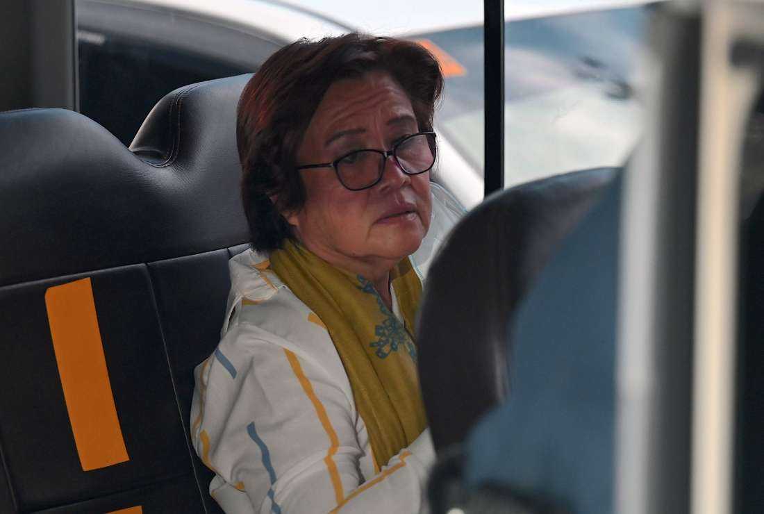 Former Philippine senator and human rights campaigner Leila de Lima leaves after after attending her hearing at the Muntinlupa Trial Court in Metro Manila on Sept. 12, 2022