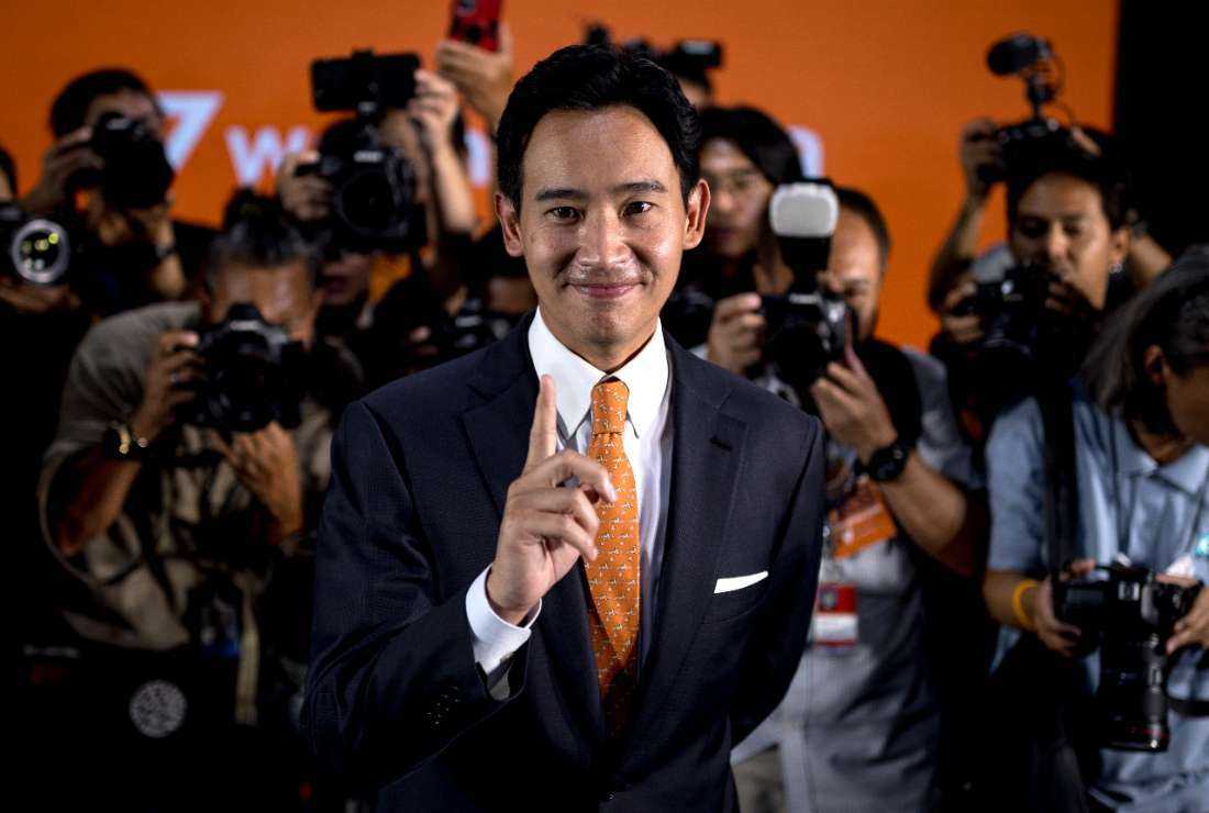 Move Forward Party leader and prime ministerial candidate Pita Limjaroenrat poses for the media following a press conference at the party headquarters in Bangkok on May 15