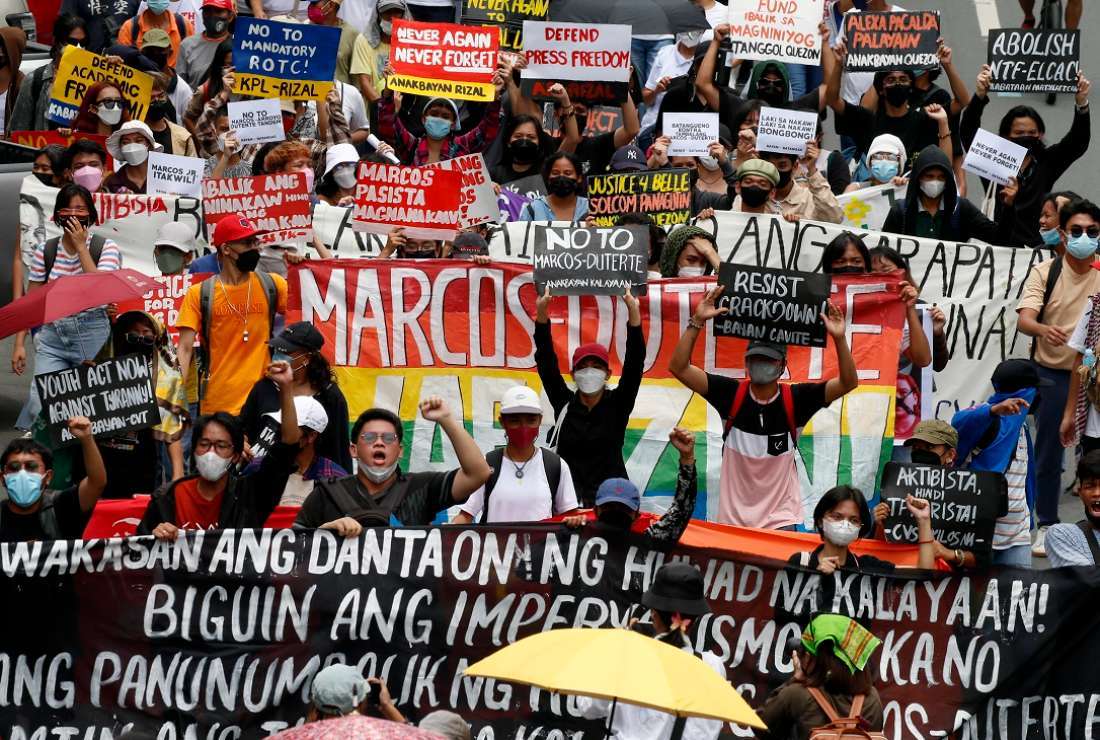 Protesters demonstrate as they gather at a square during a rally to coincide with the inauguration of Philippine President Ferdinand R. Marcos Jr. in Manila on June 30