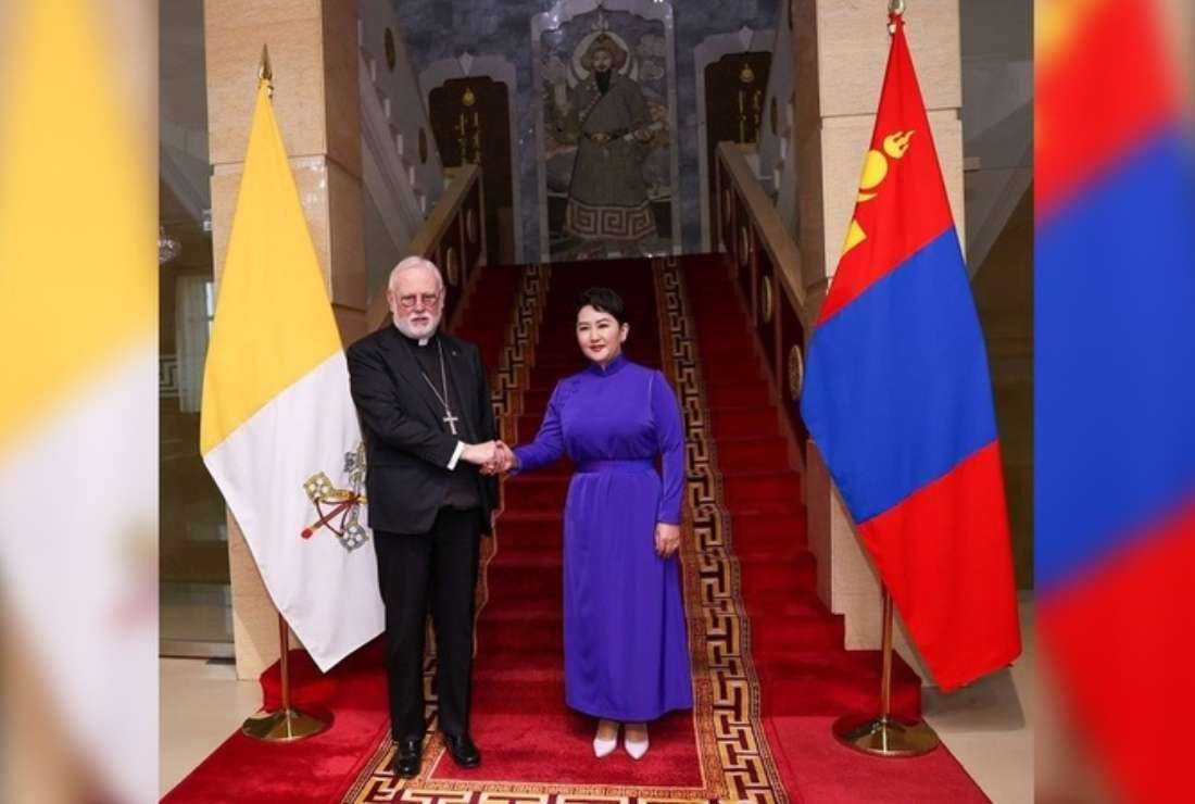 Mongolia’s Foreign Minister Battsetseg Batmunkh greets the Vatican’s secretary for relations with states, Archbishop Paul Richard Gallagher, during his visit to the country