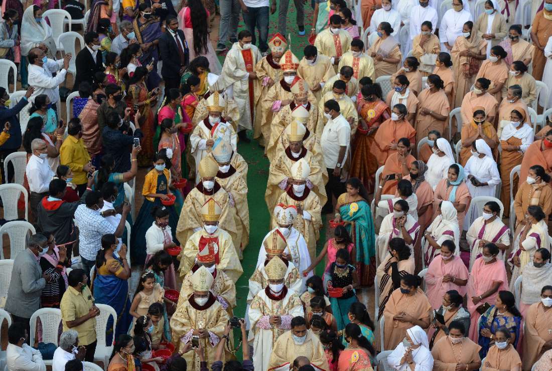 Catholic bishops in India walk to the altar for the installation ceremony of Bishop Poola Anthony as the new Archbishop of Hyderabad at Saint Mary's School grounds in Secunderabad, the twin city of Hyderabad, on Jan. 3, 2021
